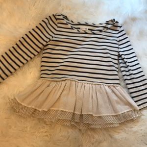Striped shirt with ruffled bottom